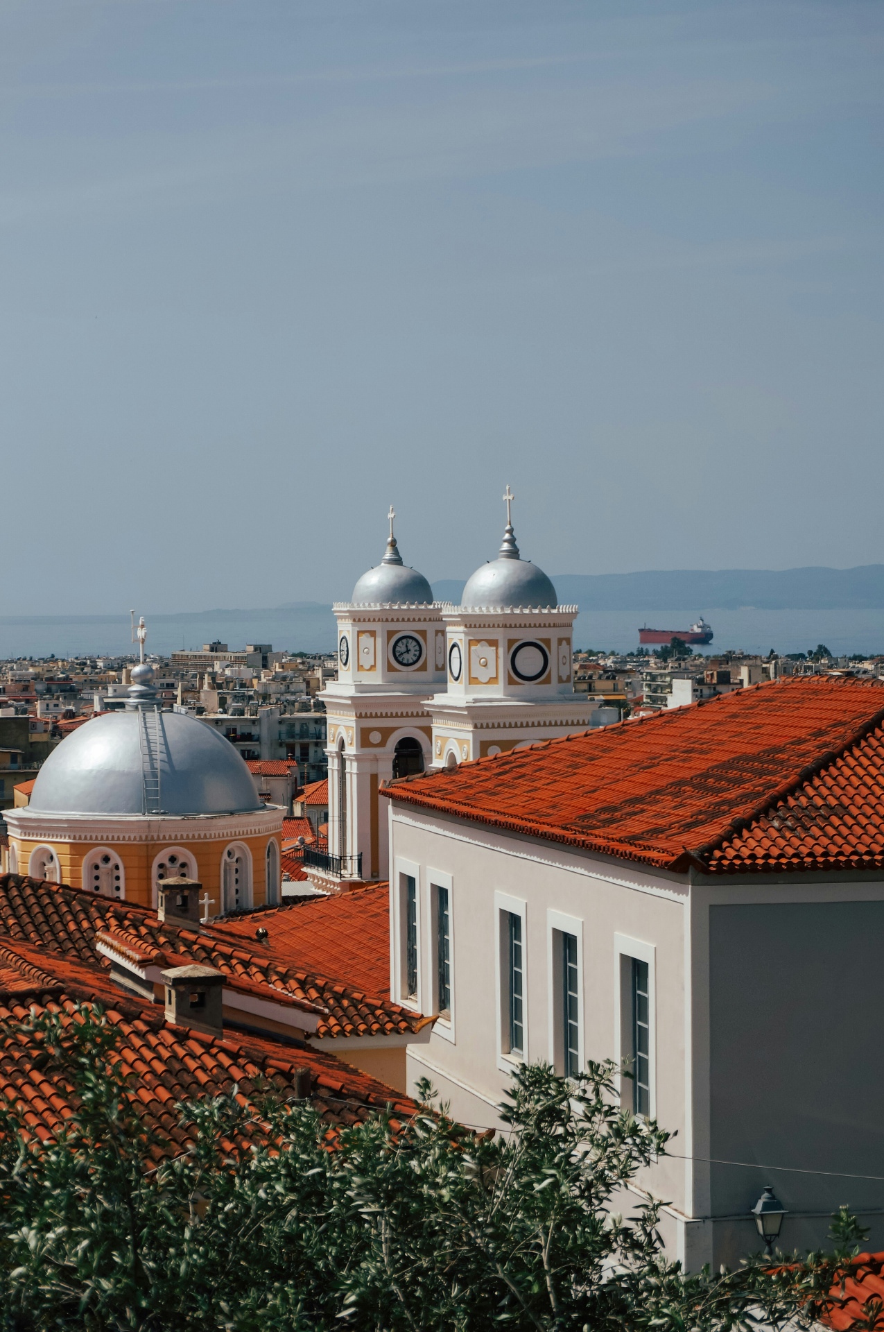 Cathedral domes and terracotta rooftops over Kalamata