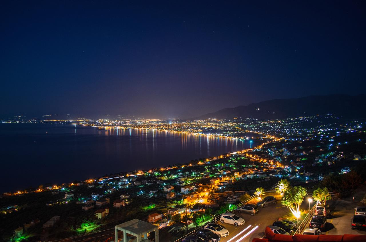 Kalamata coastline lit up at night seen from the hills